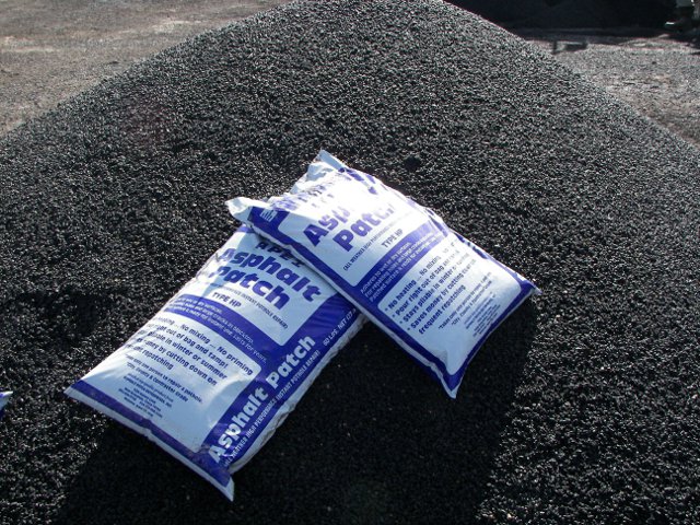 Asphalt Patch HP in 60 lb bags on mound